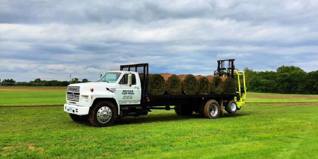 Truck loaded with rolled sod, ready for delivery